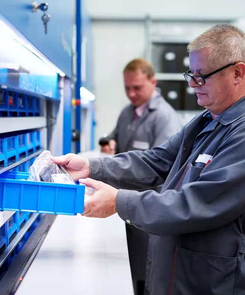  service employee looks at pieces 