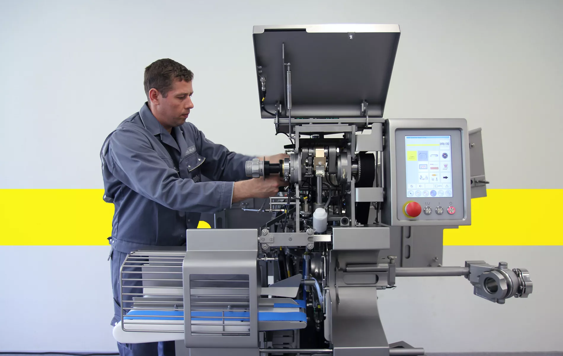 Service employee working on clipping machine 