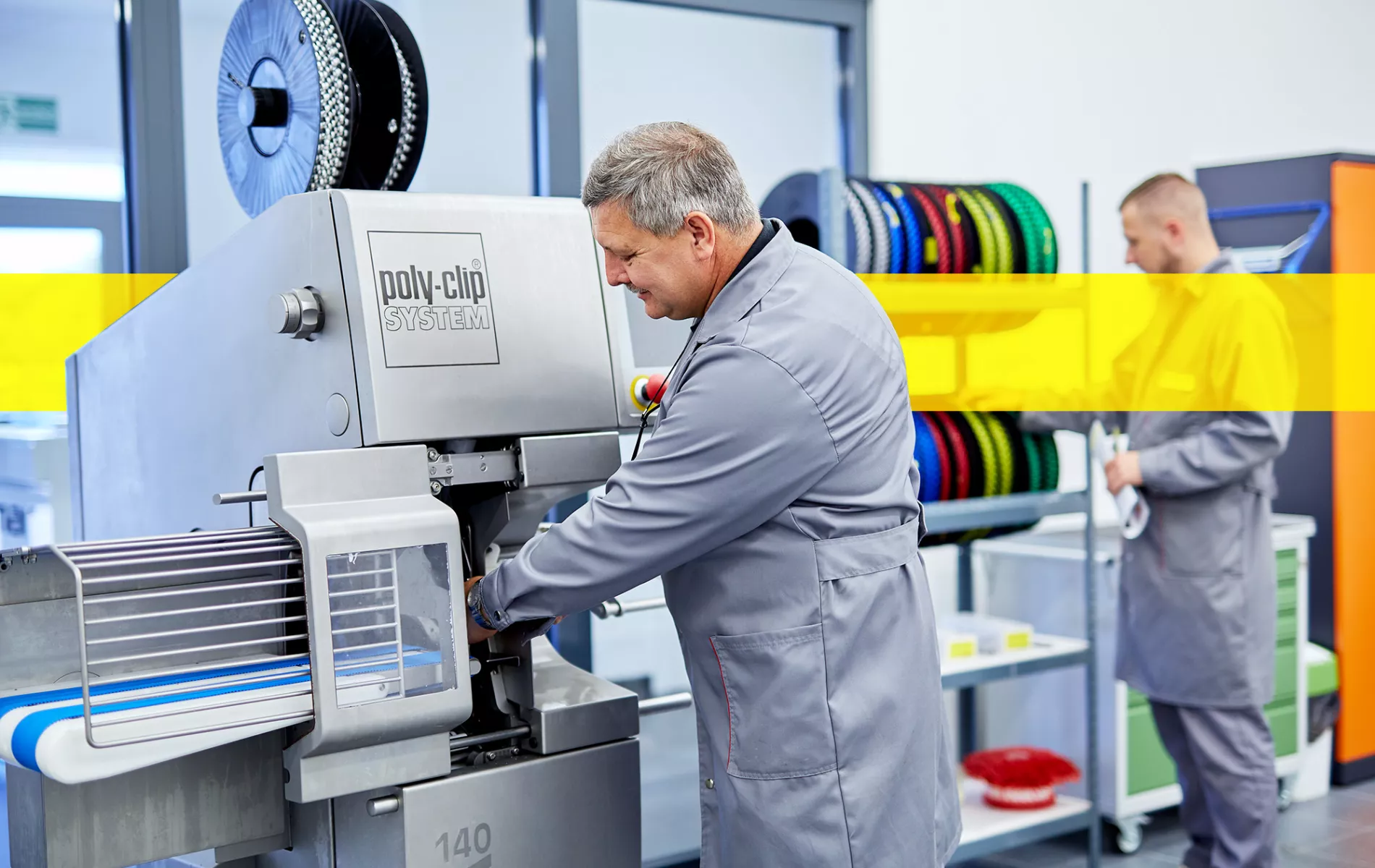 service employee working in front of machine consumables 